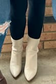 I'm sad because I really wanted to love these... my calf is too large for it to zip all the way. I've worn them, but it's just not great. - Katie H.