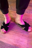 Very cute, comfortable. The black straps are like a crushed velvet material. I wear a size 8 and ordered that. I do find them sized exactly to my foot, allllllmost too small. There is zero room on my toe/heel. 8.5 would probably be a better fit but not worth the exchange process hassle. - Barbara L.