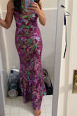 [Needed something tropical]. After reading reviews and hearing people say they loved it, I gave it a try.  Got the small and it fit like a glove, especially in the length with heels.  It did have some stretch, no slit but lined. I didn't need a bra or pads.   The sequins did fall off but not terrible.  The only problem is, when you go to the bathroom and readjust, make sure the zipper is in the middle of your butt.  I got tons of compliments on this dress. - Hillary B.