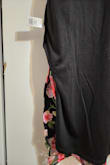 The dress is pretty, but the cut of the hem is uneven and the inner layer of the skirt sticks out since the outer layer skirt was cut too short making it uneven. The sewing of the hem, where the slit is, is also low quality as it looks like they rushed sewing it, making the skirt unevenly shaped. - Adilene J.