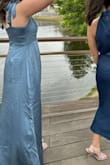 It wrinkles very easily but worked great! It was definitely a little longer than I thought as well. - Emma E.