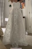 I ordered this for my high school prom. It's little scratchy and doesn't fit well for smaller chest sizes. True fit to size. You can see through the bottom part of dress. - Sarah C.