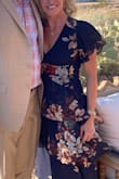 I usually wear a small but need to size up to medium. It was perfect! Super fun to dance in all night! Loves it! Got a tom of compliments on it! - Lee S.
