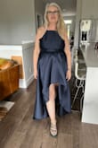 Beautiful fabric feels expensive and drapes beautifully. It looks and feels fantastic. Doesn't have room to let out so don't order a size smaller! - Lavone F.