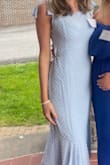 I ordered this dress for Founder's Day at my sorority and was so excited for it to come in. When I tried it on, it did nothing flattering for me. I had to use safety pins so tighten up the waist area. When I got to the house, the butt area of the dress ripped within the first 20 minutes. - Vivian M.