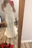 Dress is absolutely stunning, even nicer than the photos online. I love the train in the open package, so flattering, and the material is definitely high-quality. NOTE: In the info, I did provide my true measurements, but they only had a size medium, so that was the size I had to get. I would say the dress is true to size because I will have to get it taken in a few inches, which I knew ahead of time because I ordered one size up due to my size not being available. - Jayna H.