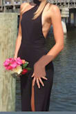 The area for perfectly out of the box although it was a little short (everything is when you're 6'2). We followed the size chart upon ordering. It was elegant, timeless and unique. The neckline especially stands out and the back. - Nicole F.