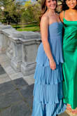 The dress was gorgeous, and the material was great quality. The color looked exactly like it did in the picture and was very vibrant. The dress did not fall down at all! Received so many compliments. It was a little long, but nothing some tailoring can't fix. - Elizabeth C.