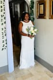 Perfect dress, I usually wear a 14/16 dress size. This dress fit perfectly. I wanted something sparkly for my private wedding and this dress seemed like it would be the one. I received lots of compliments. The lowered backing was a great way to make the dress flattering! Already thinking of when I can wear this dress again. I loved it! - ShaVonya S.