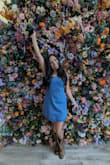 Good quality but is more flared than in the photo with model. A little large but sizing down may not fit. - Linda G.