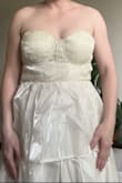 I had such high hopes for this! The color overall was too off-white, closer to a light yellow and the construction was a mess. The seams were messy/sticking out and the pleats were crooked throughout. - Lydia N.
