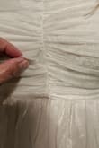 Dress is super cute and fits well. Unfortunately, it came with a small rip in the front that we had to hand sew back together. - Abby B.