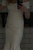 I was on the fence about buying this dress, but after trying it on it is now my favorite I own. Since it hugs your curves, it gives off an elegant but still sexy vibe, without breaking the bank! It's so versatile. I'll be wearing it for more than just my courthouse wedding. - Hanna C.