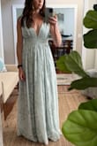 This dress was super comfortable! The slit was a conservative height. Dress was longer than most. The top was well made-no bra needed and worked for the flatttt chested, but also room for more up top! - Amy S.