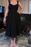 From the picture online, I thought I'd love it but nope. I bought a small, and it was still too big. Honestly, I don't think an XS would have made a difference. As the other reviews say, the straps are not adjustable either and the dress creates nothing for your figure. Also, I found it very long. I'm 5'7 and this is just a strange length. - Cailyn B.