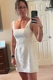 I plan to wear this for my bridal shower and am obsessed. I will say it's slightly big, but I worry that the XS would be too short. - Emily C.