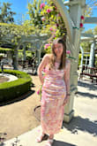 I wore this dress for my cousin's late April wedding and love how light and soft it was. It's a good length and fits well around the bust area. The ruching and leg slit are also very flattering. Nice dress for a photo shoot or spring/summer special event - Olivia V.