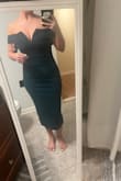 I ordered this for a wedding it fit perfectly! Not much stretch in the dress! I was really in between sizes with a small and a medium. I ended up with a small. - Erica S.