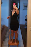 131.4 pounds, before eating. 27" waist and 38" hips after eating breakfast. Don't need bra but can wear sticky covers if needed. I am petite on top so the straps were a little but not annoyingly so. I wanted a deep V black dress to accentuate a necklace that ended up being shorter and smaller than anticipated. Tahoe in April 2024 was so hot that I wore this with a short black cloak to cover shoulders and light nude pantyhose. I assume most people are wearing this dress for a night out. The fabric was thick but not constricting. I am 5'3" and it came up above knees. I am standing on a chair so you can see a full body photo. Based on price point, I am planning to wear this as a casual dress when I don't want to make effort. There is also wire on the edge of the V to hold up the dress. - Kathleen C.