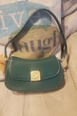 I love my purse!! It is the perfect size and looks just like the picture!! I've already received a few compliments on it so far!!! Very happy with my purchase!! Thank you!! - Stacy S.