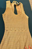 This dress is super cute. You can wear it with a bikini!!! - Somin S.