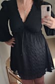 I originally went bigger on this dress because I am always afraid of things being too small. I then exchanged for my actual size, (L) which fit perfectly! Totally comfortable, lightweight material, and flattering. FYI, the photo was right out of the bag before it was washed or ironed. I will definitely wear this again. I received quite a few compliments on how nice it was. - Kim R.