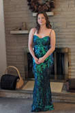 Bought this dress for my daughter's senior prom. The photos don't show just how beautiful the colors are on this dress! The sequins go from blue to green to purple depending on the light and angle you're looking at the dress from. Only had to hem the bottom up an inch! She was covered everywhere and able to walk, dance, or just plainly move around without worrying that she had to hold her dress up or over! Both she and I could not have been more pleased, between the fast shipping and the low cost of a gorgeous dress. We have told everyone that Lulu's is fantastic! - Carrie W.