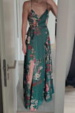 This is a very nice dress; it fits perfectly. Maybe a little bit too long but still gorgeous!! - Melanie V.