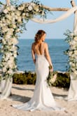 This ended up being the dress I had always wanted. Only needed a little hemming in the front because I am short and went barefoot. The fabric was high quality and the beading was stunning. The sheer top was elegant and not too revealing. - Kat Y.