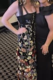 Very comfortable and flattering. I sized up to a large based on other reviews. I gave 4 stars because the dress needed some polishing before wearing (threads trimmed, creased flowers ironed) and the liner at the top hem kept showing slightly but wasn't super noticeable. Overall great dress and would recommend it! - Steph B.