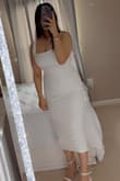 The dress is gorgeous and the fabric feels great. It hugs my figure just right and the look is simply amazing. Hoping it comes in more colors! - Sukhman K.