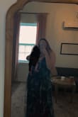 I got an XL and it fit really well but was a little long. It ended up being perfectly fine with heels though. It was super easy to nurse in and I got a lot of compliments. - Marilyn Y.
