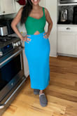 Feel like a million bucks in this dress. It's soft and flattering and the colors are so vibrant. The cutout is tasteful and the best part is you can wear a regular bra without an issue. It's perfect for spring because of the sweater material and also for summer because of the light colors and because it's sleeveless. Go for it!!! - Marline K.