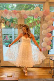 I wore this dress for my engagement party and it was PERFECT! Great support for "the girls", elegant butterfly details and corset tie, and I got soo many compliments! - Mel G.