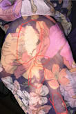 Within the first hour of wearing the garment the sleeve began to get runs in it and shred. Expected better quality for a dress that cost nearly $100. - Megan H.