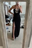 Wore this recently for a black tie wedding and received so many compliments! I am usually weary of strapless dresses but this one didn't budge. I didn't spend all night pulling it up, which made it all the better. It is a tad long for us short girlies, but was fine with tall heels. Definitely recommend! - Brittany P.