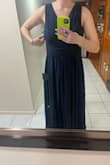 The material is super nice; it's very heavy. It might actually be too warm for a Memorial Day wedding. The length was absolutely perfect. I'm 5'10 and won't need to shorten the length at all. I got a medium and it fits great. The only place I'll need to take it in a smidge is the armpit area. The slit wasn't as high as other reviews made it seem. - Olivia L.