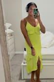 This was lightweight and the adjustable straps made it a perfect customizable fit. Def recommend steaming this ahead of wearing it as it does get visible wrinkles. Such a fun color and I paired with pink heels. - Devin H.