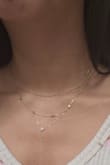 I got this to add to one of my necklaces to create a nice layered look and it's very pretty! - Kimi C.