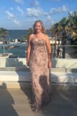 This dress will get you so many compliments. It's forgiving in the hips and waist. I am small busted and it was tight. I would size up. The dress is very long too. - Lindsey M.