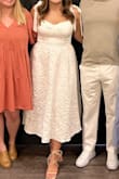 Wore this for my bridal shower and got so many compliments!! It was a little snug around my chest/waist but it really snatched you in and made you feel secure. I loved all the details like the bow sleeves and pattern on the dress. Sometimes midi dresses swallow me up but this was a great length for me being on the shorter side! - Rachel S.