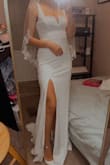 I loved the neck line. Loved the split. Loved the stretchy material. Love the open back. It was my ideal dress. However, once it arrived, they had this weird lining going around the legs. I wish it didn't have it. - Kaylee D.