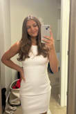 The quality of this dress is awesome, I get a little nervous with white dresses being see through but did not have that issue at all with this dress. It fits a little looser than how I thought it would fit compared to the picture. This dress was perfect for graduation, super simple and love the open back. - Trinity L.