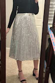 This skirt was perfect for New Year's Eve. I love midi skirts and paired it with a classic black sweater. - Faith B.