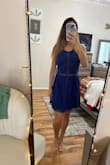 So you can't see all the pretty stitching/holes in my picture, but the dress is comfy and I cannot wait to wear it for the real occasion. Whatever that is! Big fan! Love the material, the fit and the dress just so much - Victoria S.
