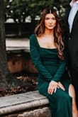 I was looking for a somewhat-formal long-sleeved dress for our engagement pictures. When I found this green one, I knew I had to have it! I ordered an XS, and it was big but not noticeable. I thought it was especially large in the shoulder area. Nothing a little bit of tailoring couldn't fix if I plan to wear it again! - Morgan A.