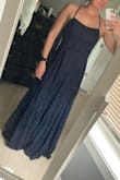 Beautiful dress. Loved it but is a little heavy; the thin straps made me nervous that it wouldn't hold up all night. Sizing was perfect - size small, 5'5, 130lbs, 34B - Samantha B.
