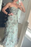 Followed the suggestions that said to size up but probably would have been better off sticking with my usual size. Although, the corset-style back allows for flexibility. Great quality and absolutely loved the pattern of this dress, just didn't love how the strapless looked on me. 5'5, 130lbs, 34B - bought a medium - Samantha B.