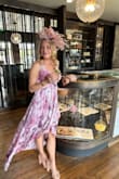 I wore the pink/purple dress to a Kentucky Derby party and I received many compliments. The material is lightweight and flows nicely. Straps are adjustable. I did put a stitch in the top to make sure it stayed together when I leaned over. - Amanda Y.
