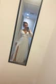 This was a great fit. Not a fan of my arms so was looking for a comfortable dress that hid them but was also nice to wear to my engagement party. What was most upsetting was the length. This dragged on the floor even with 3 inch heels. Also a bra is tough to wear with this as the back dips down very low. Cute dress if you can avoid those things or if that doesn't [bother] you. Looking forward to wearing it this weekend at our party! - NICOLE M.